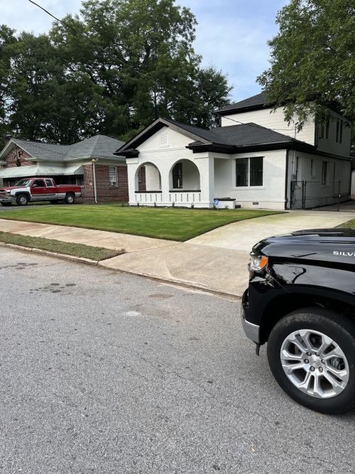  alt='We are extremely pleased with the job John and his crew did for our yard'