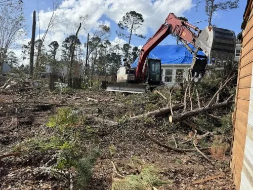 Alex Chronos and team worked tirelessly on our property removing fallen trees, roots and debris and hauling to areas for