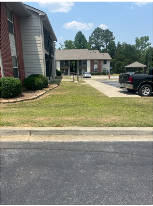  alt='These gentlemen showed up when they said they would, they were very nice, and they did a great job mowing my yard'