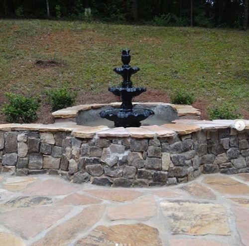  alt='Shook’s Landscaping came today 10/28/25 to trim our very out of shape shrubs. It is cold and rainy'