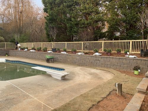  alt='Both owner and the crew of Autumn Landscaping did a great job on a major landscaping project: The location deep in my'
