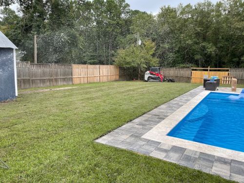  alt='My husband and I had been looking to have our backyard filled and leveled for a couple years'