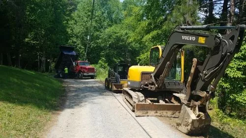 Needed driveway grading, gravel and retaining wall replacement.  Shawn and his crew came that day after estimateing work to